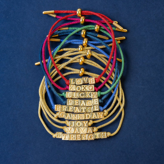 Goldie Blue Lurex Cord With Brass Letters Adjustable Breathe Sliding Knot