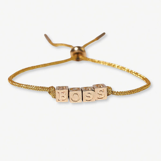 Goldie Gold Lurex Cord With Brass Letters Adjustable Boss Bracelet