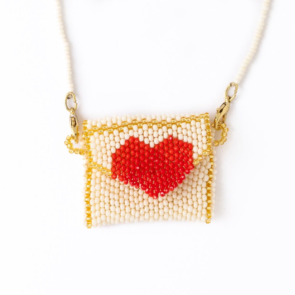 Izzie Pouch Necklace With Red Heart Ivory Pendant