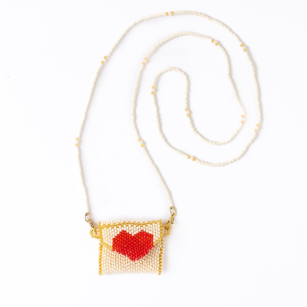 Izzie Pouch Necklace With Red Heart Ivory Pendant