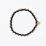 Kami Crystal With Brass Charm Stretch Bracelet Black + Gold Stretch