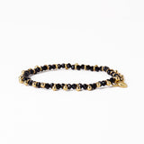 Kami Crystal With Brass Charm Stretch Bracelet Black + Gold Stretch