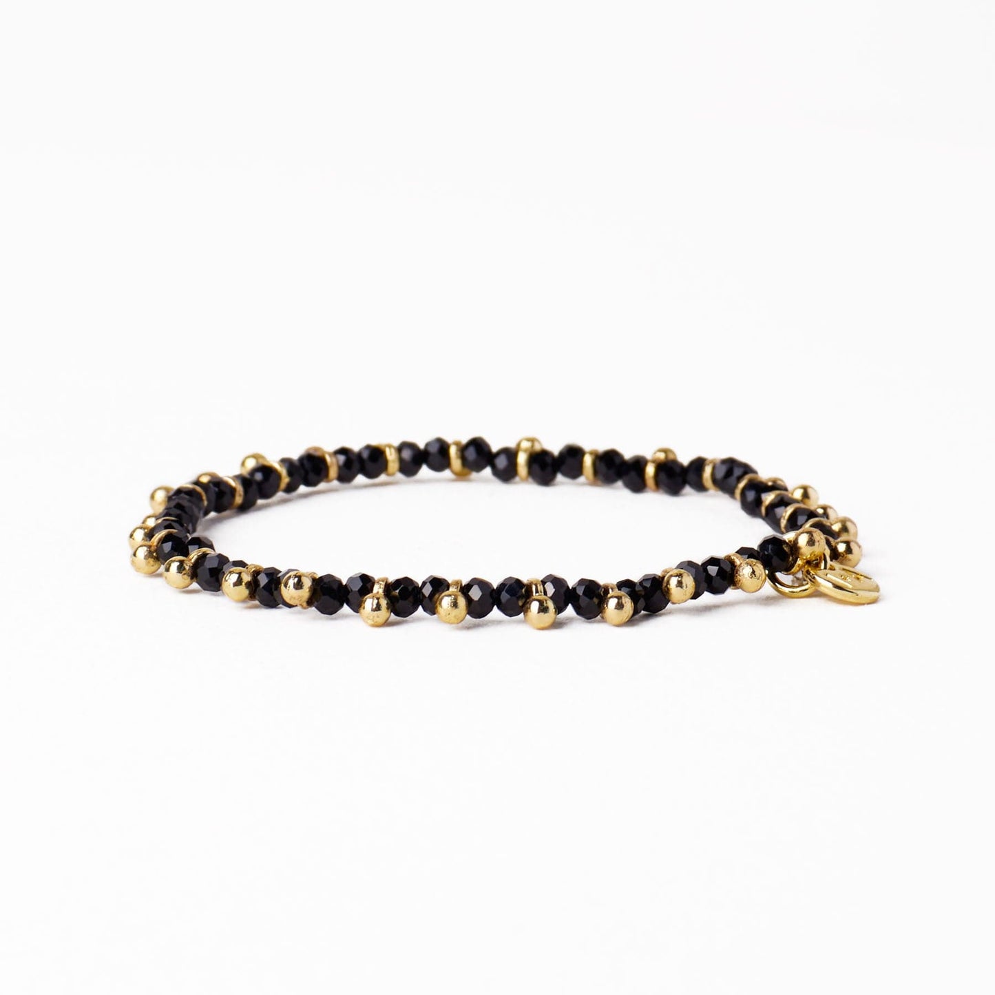Kami Crystal With Brass Charm Stretch Bracelet Black + Gold Stretch