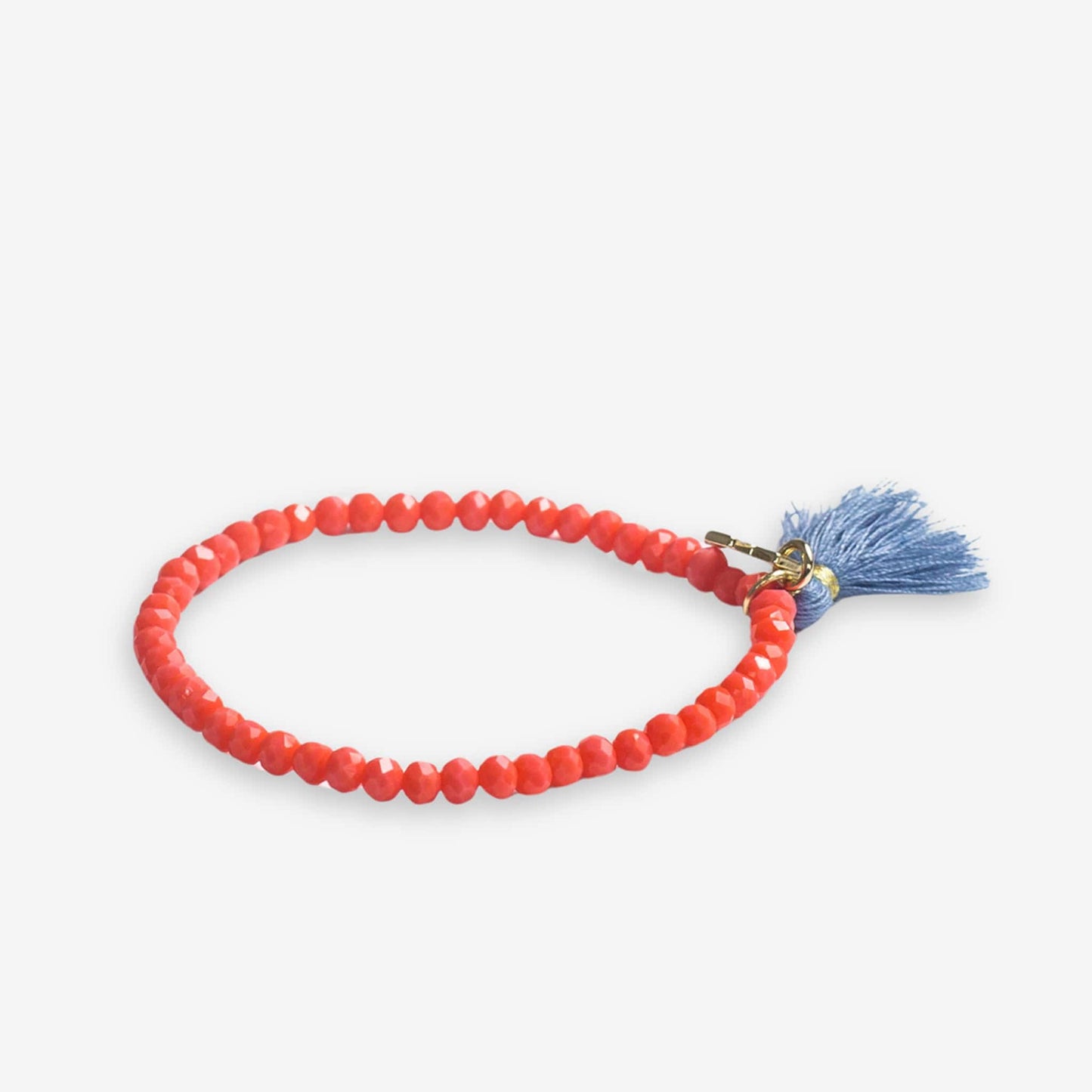Patsy Solid Crystal Stretch Bracelet With Tassel Coral