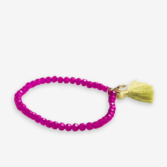 Patsy Solid Crystal Stretch Bracelet With Tassel Hot Pink