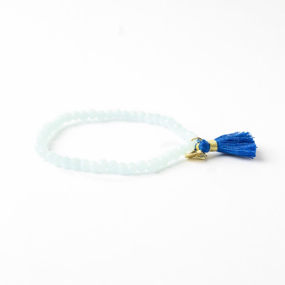 Patsy Solid Crystal Stretch Bracelet With Tassel Light Blue Stretch
