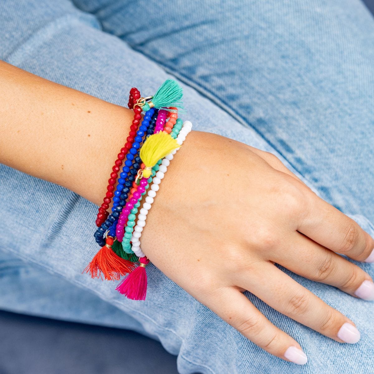 Patsy Solid Crystal Stretch Bracelet With Tassel Navy