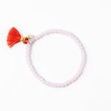 Patsy Solid Crystal Stretch Bracelet With Tassel Pink Stretch