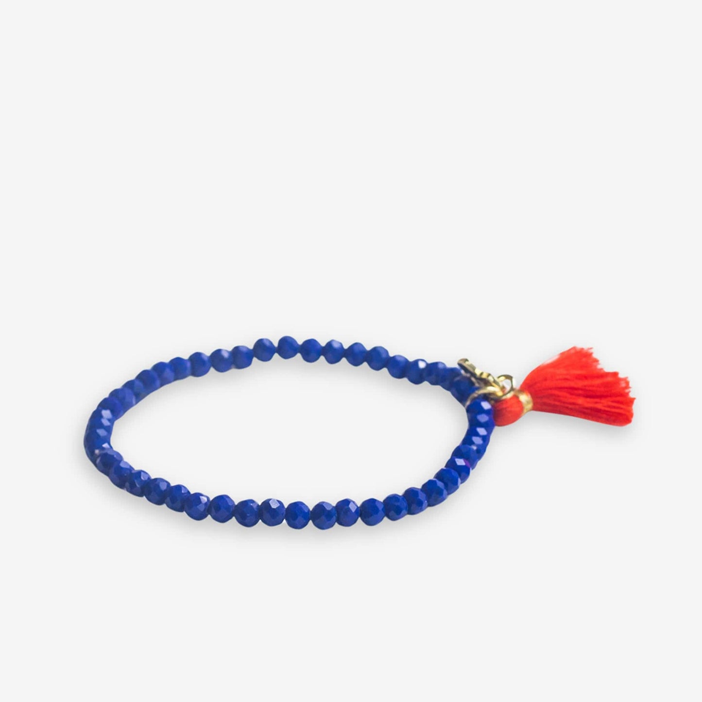 Patsy Solid Crystal Stretch Bracelet With Tassel Royal Blue